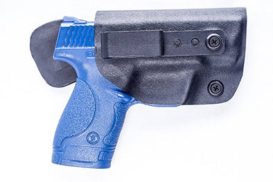 Gun with blue handle inside black gun holster